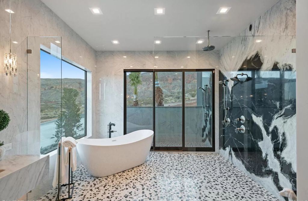 The Home in Utah is a luxurious home boasts the finest of finishes and taste in every square inch now available for sale. This home located at 3652 S Cypress Point Rd, Hurricane, Utah; offering 4 bedrooms and 5 bathrooms with over 6,000 square feet of living spaces.