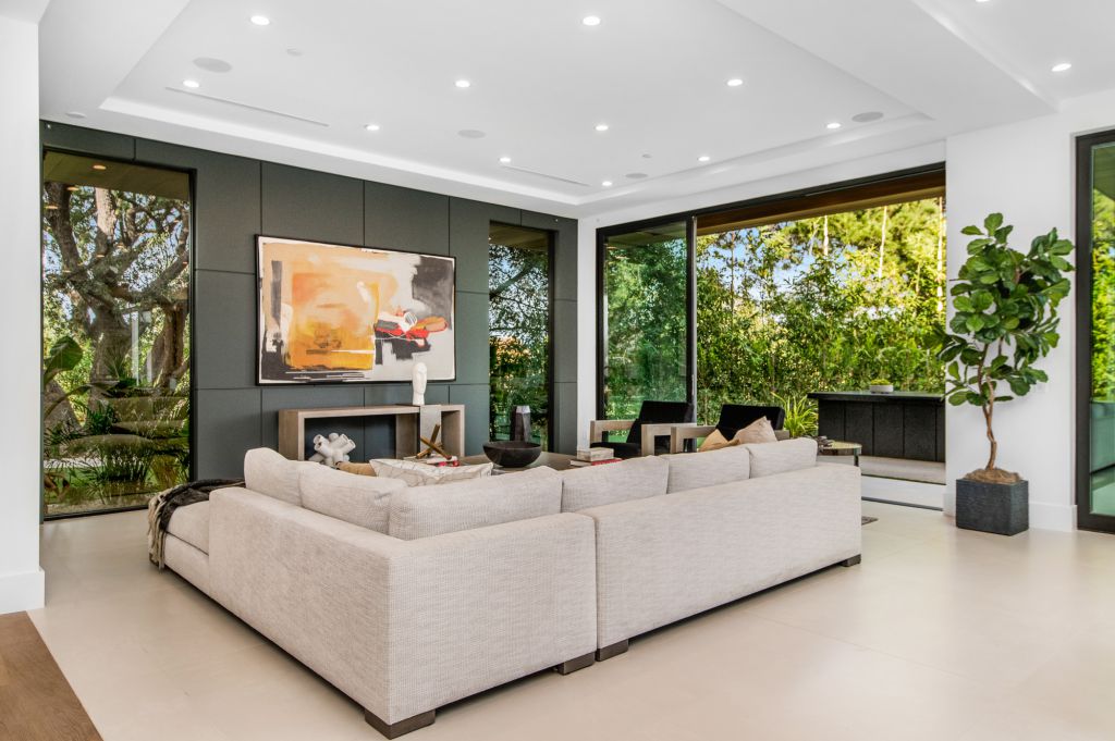The House in Encino is a newly constructed contemporary masterpiece with unobstructed views in the coveted Royal Oaks now available for sale. This home located at 3950 Royal Oak Pl, Encino, California; offering 8 bedrooms and 14 bathrooms with over 13,000 square feet of living spaces