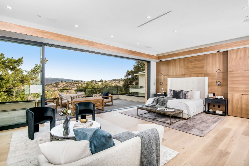 The House in Encino is a newly constructed contemporary masterpiece with unobstructed views in the coveted Royal Oaks now available for sale. This home located at 3950 Royal Oak Pl, Encino, California; offering 8 bedrooms and 14 bathrooms with over 13,000 square feet of living spaces