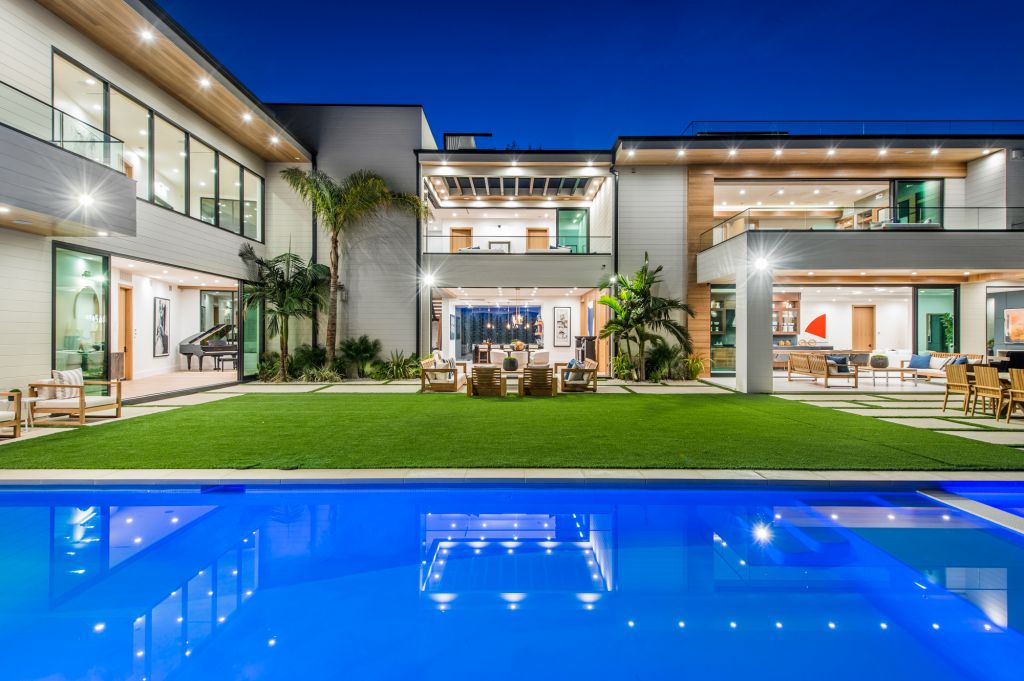 The House in Encino is a newly constructed contemporary masterpiece with unobstructed views in the coveted Royal Oaks now available for sale. This home located at 3950 Royal Oak Pl, Encino, California; offering 8 bedrooms and 14 bathrooms with over 13,000 square feet of living spaces
