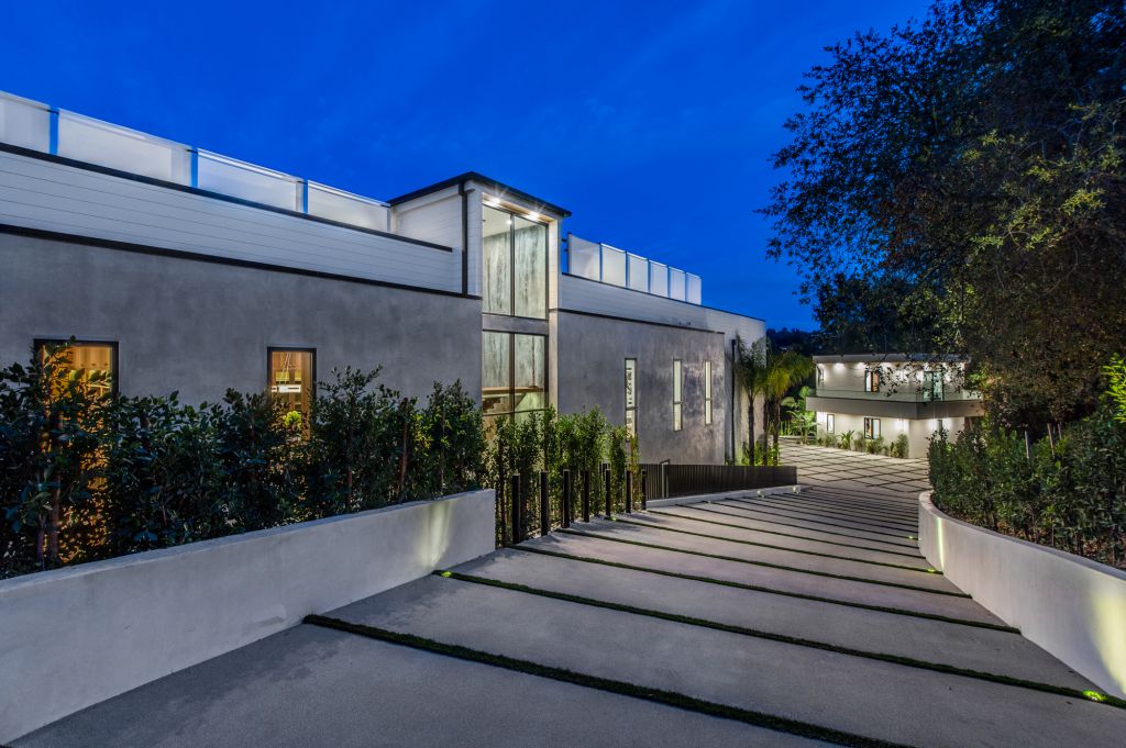 The House in Encino is a newly constructed contemporary masterpiece with unobstructed views in the coveted Royal Oaks now available for sale. This home located at 3950 Royal Oak Pl, Encino, California; offering 8 bedrooms and 14 bathrooms with over 13,000 square feet of living spaces