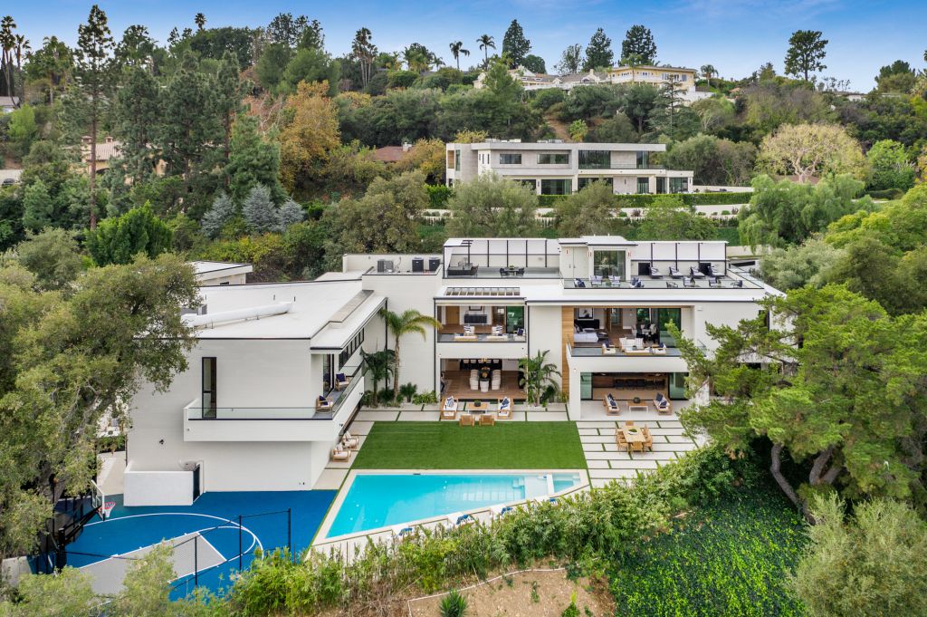 The House in Encino is a newly constructed contemporary masterpiece with unobstructed views in the coveted Royal Oaks now available for sale. This home located at 3950 Royal Oak Pl, Encino, California; offering 8 bedrooms and 14 bathrooms with over 13,000 square feet of living spaces