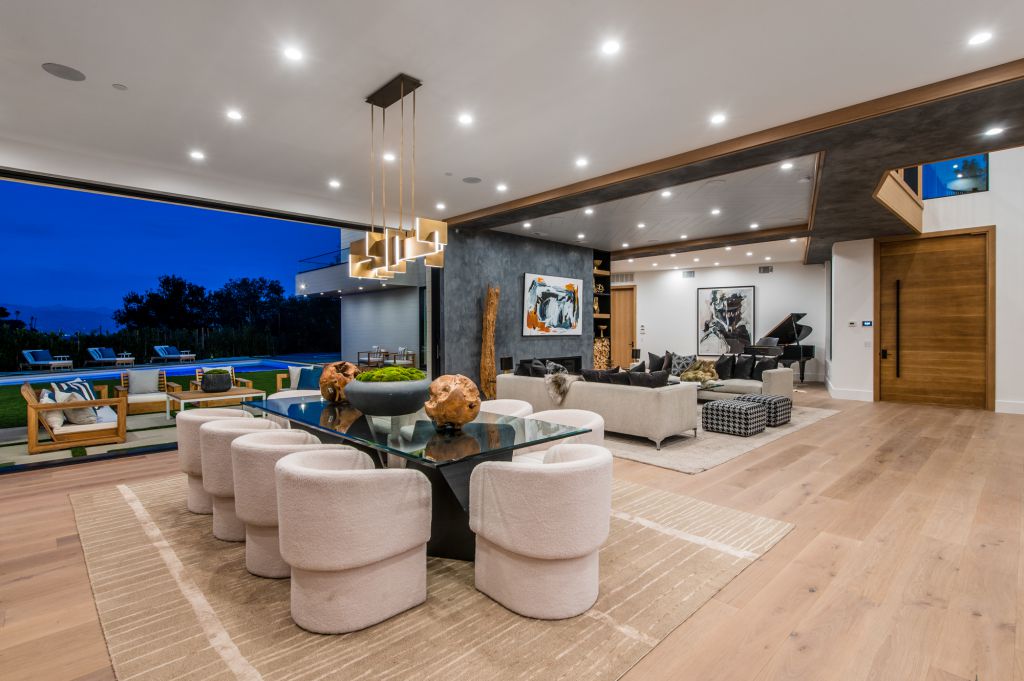 The House in Encino is a newly constructed contemporary masterpiece with unobstructed views in the coveted Royal Oaks now available for sale. This home located at 3950 Royal Oak Pl, Encino, California; offering 8 bedrooms and 14 bathrooms with over 13,000 square feet of living spaces