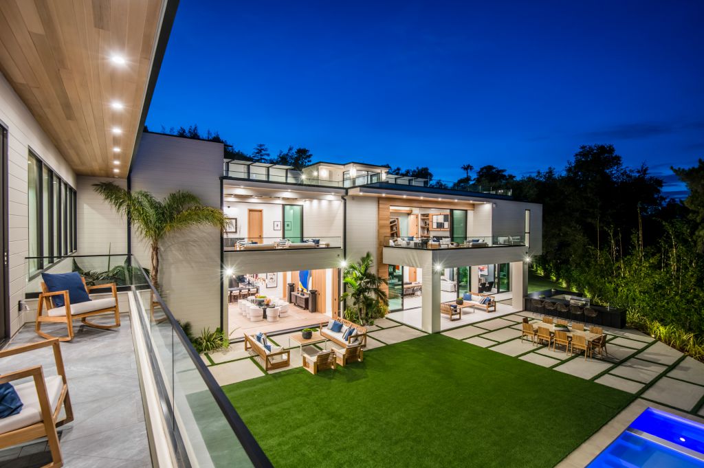 The House in Encino is a newly constructed contemporary masterpiece with unobstructed views in the coveted Royal Oaks now available for sale. This home located at 3950 Royal Oak Pl, Encino, California; offering 8 bedrooms and 14 bathrooms with over 13,000 square feet of living spaces