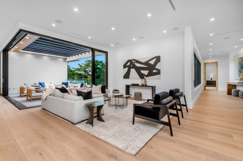 The House in Encino is a newly constructed contemporary masterpiece with unobstructed views in the coveted Royal Oaks now available for sale. This home located at 3950 Royal Oak Pl, Encino, California; offering 8 bedrooms and 14 bathrooms with over 13,000 square feet of living spaces