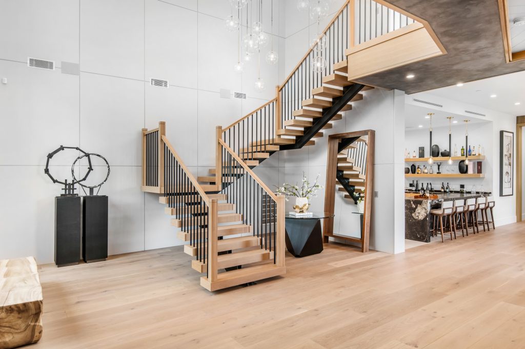 The House in Encino is a newly constructed contemporary masterpiece with unobstructed views in the coveted Royal Oaks now available for sale. This home located at 3950 Royal Oak Pl, Encino, California; offering 8 bedrooms and 14 bathrooms with over 13,000 square feet of living spaces