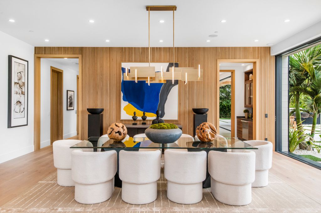 The House in Encino is a newly constructed contemporary masterpiece with unobstructed views in the coveted Royal Oaks now available for sale. This home located at 3950 Royal Oak Pl, Encino, California; offering 8 bedrooms and 14 bathrooms with over 13,000 square feet of living spaces