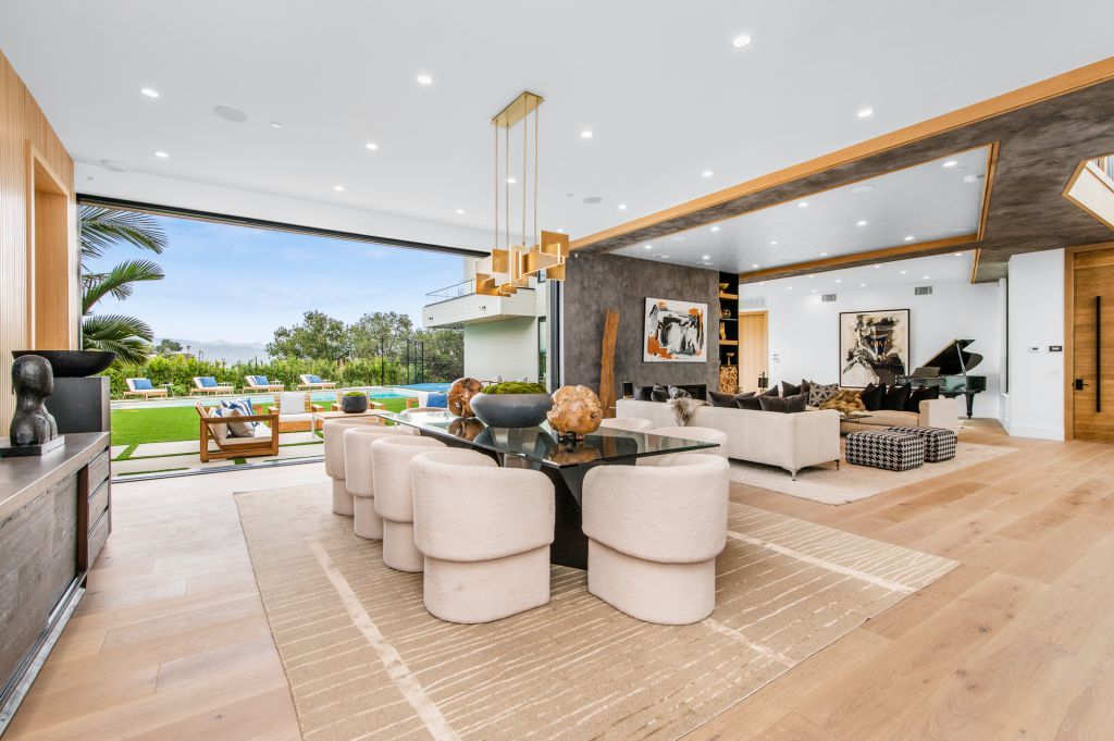 The House in Encino is a newly constructed contemporary masterpiece with unobstructed views in the coveted Royal Oaks now available for sale. This home located at 3950 Royal Oak Pl, Encino, California; offering 8 bedrooms and 14 bathrooms with over 13,000 square feet of living spaces