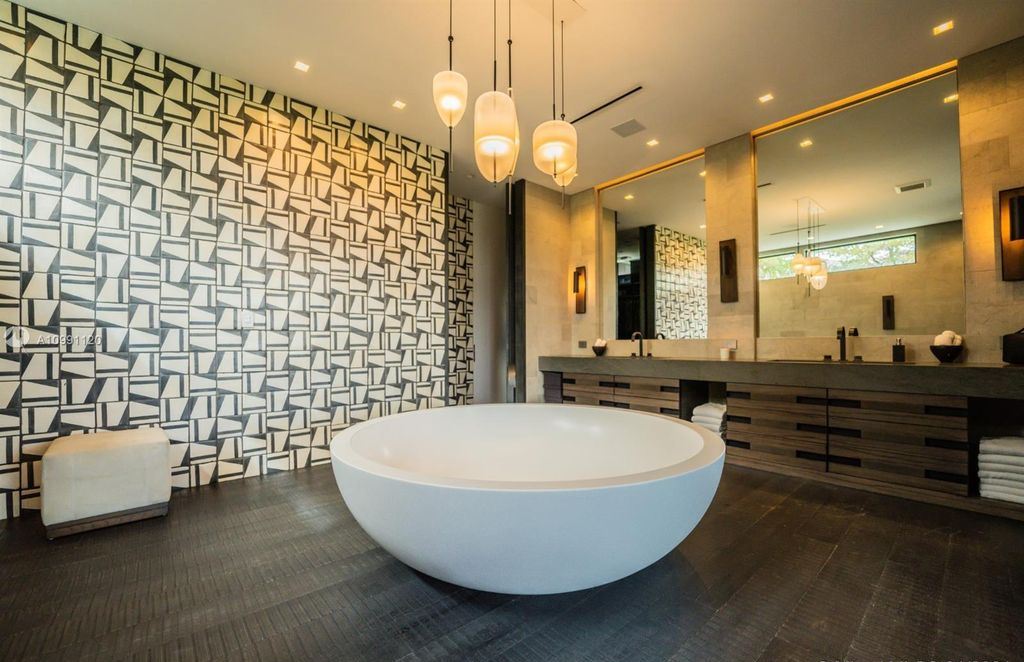 The Coral Gables House is a luxurious estate in gated amenity-rich Islands of Cocoplum now available for sale. This home located at 132 Paloma Dr, Coral Gables, Florida; offering 5 bedrooms and 6 bathrooms with over 6,300 square feet of living spaces.