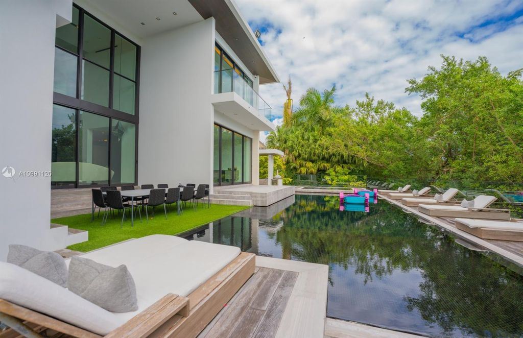 The Coral Gables House is a luxurious estate in gated amenity-rich Islands of Cocoplum now available for sale. This home located at 132 Paloma Dr, Coral Gables, Florida; offering 5 bedrooms and 6 bathrooms with over 6,300 square feet of living spaces.