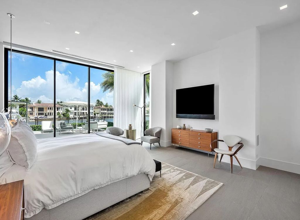 The Boca Raton Mansion is a spectacular contemporary residence on an oversized Intracoastal Waterway lot now available for sale. This home located at 819 Orchid Dr, Boca Raton, Florida; offering 9 bedrooms and 14 bathrooms with over 12,600 square feet of living spaces.