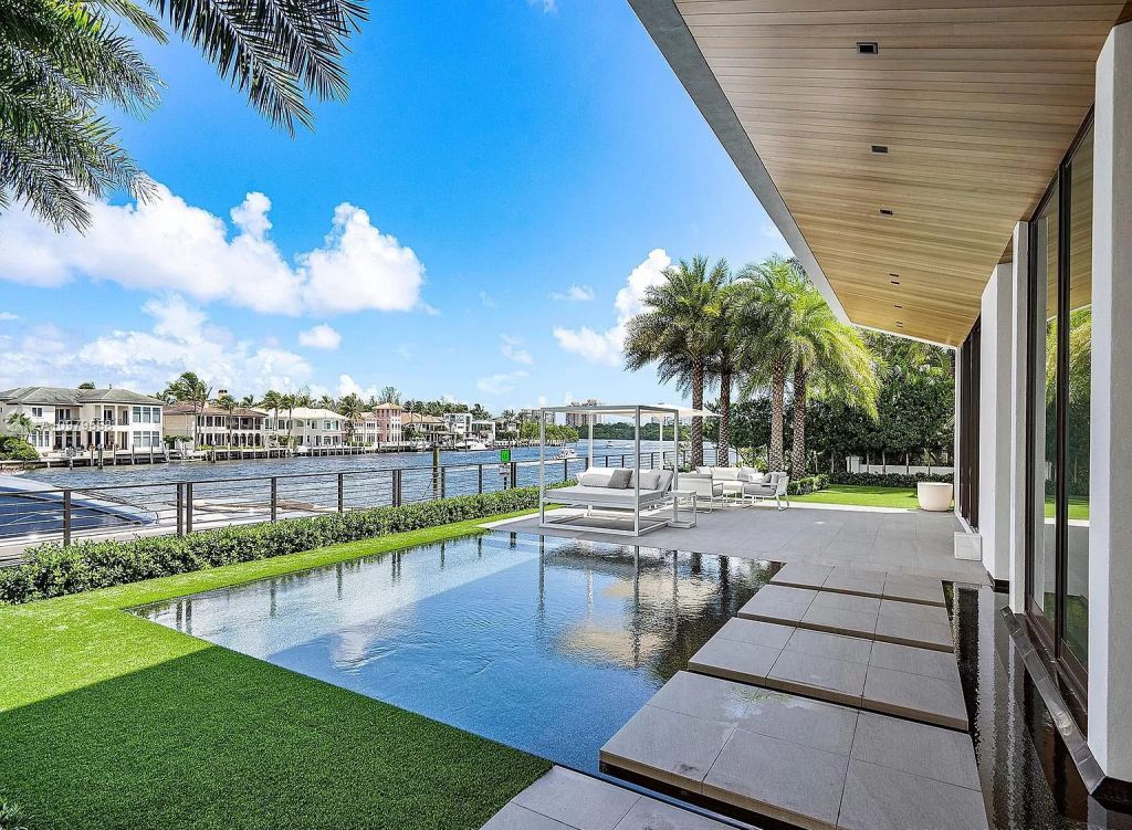 The Boca Raton Mansion is a spectacular contemporary residence on an oversized Intracoastal Waterway lot now available for sale. This home located at 819 Orchid Dr, Boca Raton, Florida; offering 9 bedrooms and 14 bathrooms with over 12,600 square feet of living spaces.