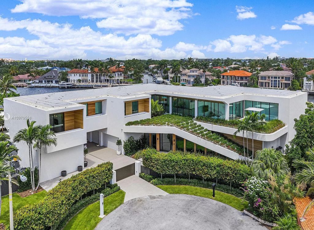 The Boca Raton Mansion is a spectacular contemporary residence on an oversized Intracoastal Waterway lot now available for sale. This home located at 819 Orchid Dr, Boca Raton, Florida; offering 9 bedrooms and 14 bathrooms with over 12,600 square feet of living spaces.