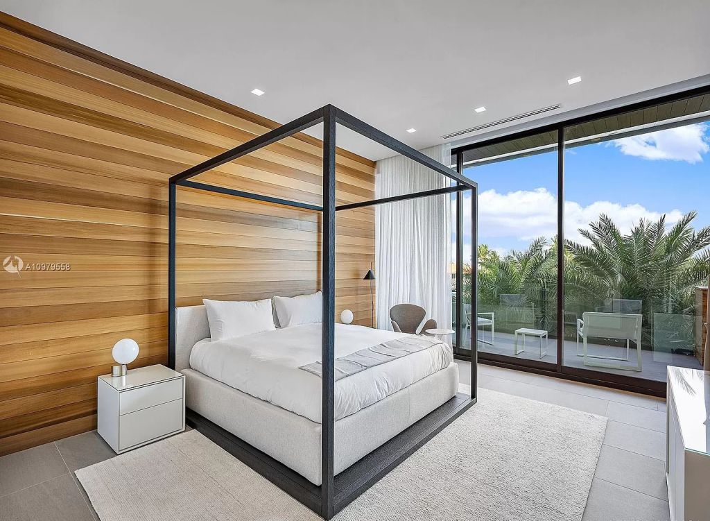 The Boca Raton Mansion is a spectacular contemporary residence on an oversized Intracoastal Waterway lot now available for sale. This home located at 819 Orchid Dr, Boca Raton, Florida; offering 9 bedrooms and 14 bathrooms with over 12,600 square feet of living spaces.