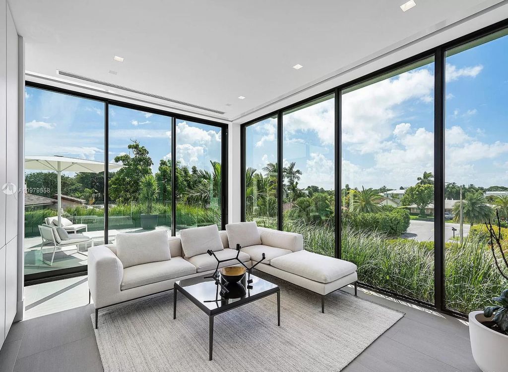 The Boca Raton Mansion is a spectacular contemporary residence on an oversized Intracoastal Waterway lot now available for sale. This home located at 819 Orchid Dr, Boca Raton, Florida; offering 9 bedrooms and 14 bathrooms with over 12,600 square feet of living spaces.