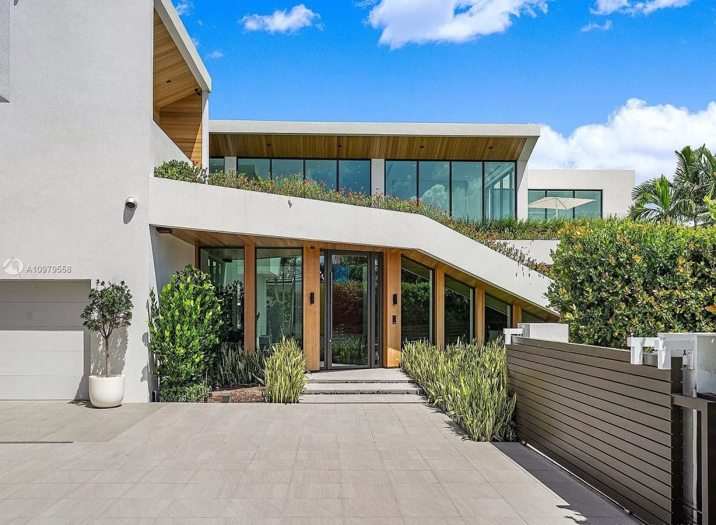 The Boca Raton Mansion is a spectacular contemporary residence on an oversized Intracoastal Waterway lot now available for sale. This home located at 819 Orchid Dr, Boca Raton, Florida; offering 9 bedrooms and 14 bathrooms with over 12,600 square feet of living spaces.