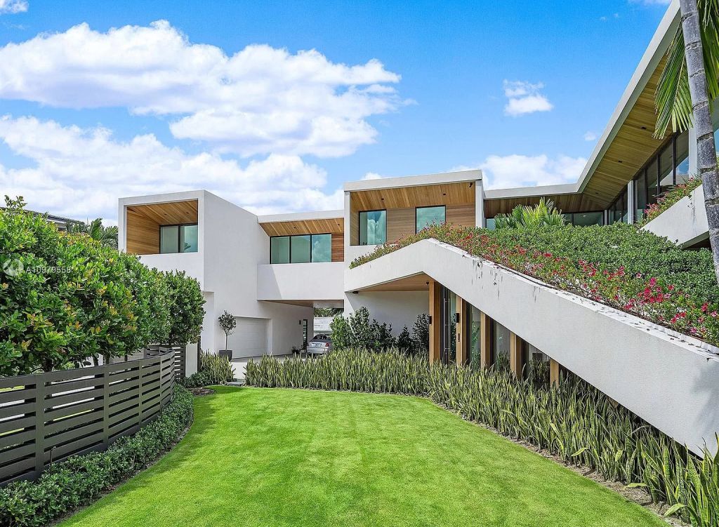 The Boca Raton Mansion is a spectacular contemporary residence on an oversized Intracoastal Waterway lot now available for sale. This home located at 819 Orchid Dr, Boca Raton, Florida; offering 9 bedrooms and 14 bathrooms with over 12,600 square feet of living spaces.