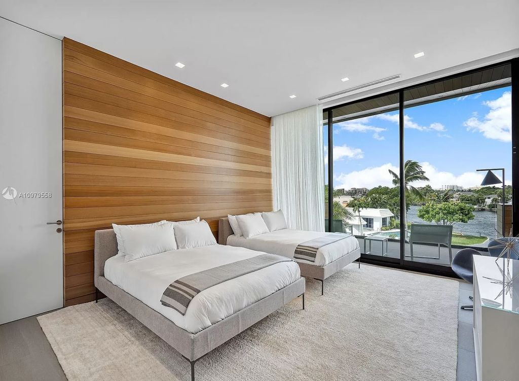 The Boca Raton Mansion is a spectacular contemporary residence on an oversized Intracoastal Waterway lot now available for sale. This home located at 819 Orchid Dr, Boca Raton, Florida; offering 9 bedrooms and 14 bathrooms with over 12,600 square feet of living spaces.