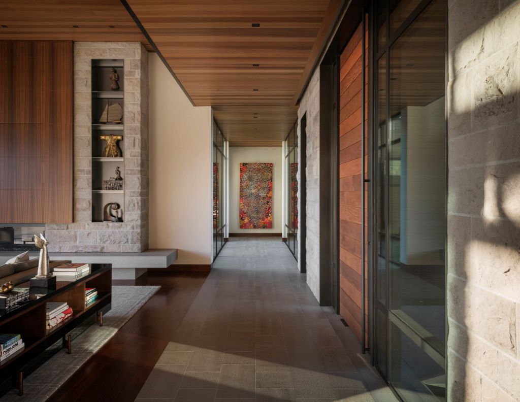 Portola Valley House in California was designed by SB Architects in Modern style to create an intimate space and a single-story home to age in place; this house offers views of the rolling hills overlooking the valley in several directions, creating an idyllic escape.