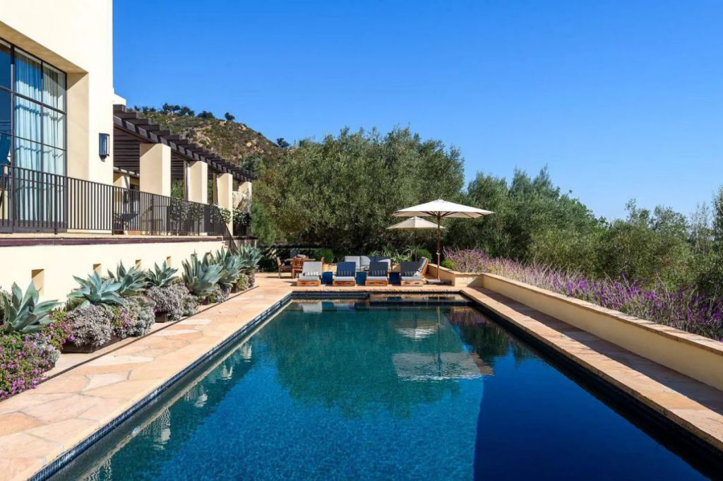 The Santa Barbara Home is a contemporary masterpiece redefines elevated living with gorgeous views and timeless romance now available for sale. This home located at 1630 E Mountain Dr, Santa Barbara, California; offering 5 bedrooms and 7 bathrooms with over 10,000 square feet of living spaces.