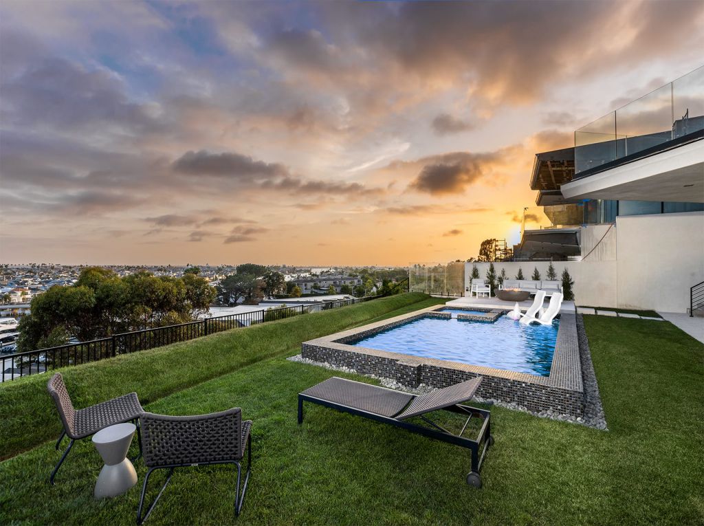 The California House is a stunning example of modern luxury and flawless contemporary design now available for sale. This home located at 1207 Dolphin Ter, Corona Del Mar, California; offering 6 bedrooms and 8 bathrooms with over 7,700 square feet of living spaces.