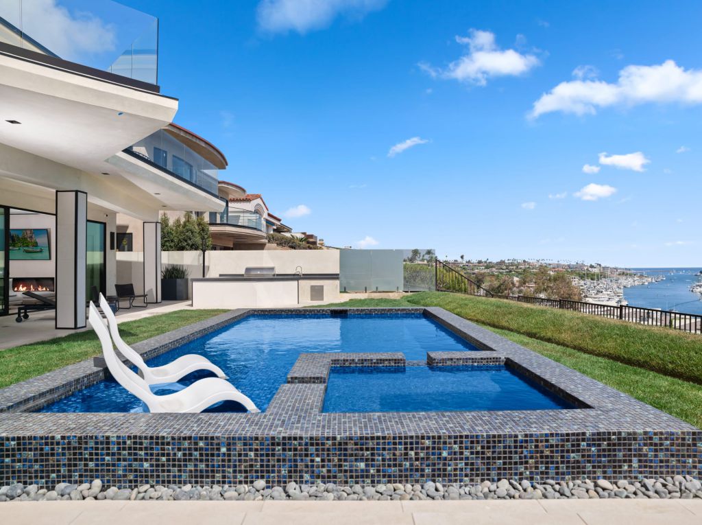 The California House is a stunning example of modern luxury and flawless contemporary design now available for sale. This home located at 1207 Dolphin Ter, Corona Del Mar, California; offering 6 bedrooms and 8 bathrooms with over 7,700 square feet of living spaces.