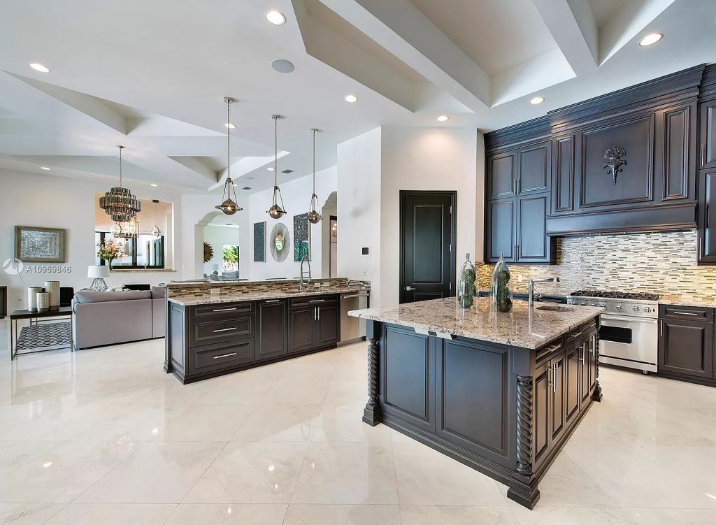 The Pinecrest Home is a classic and superior architectural design property with exquisite, finest modern finishes and details now available for sale. This home located at 13000 SW 63rd Ave, Pinecrest, Florida; offering 6 bedrooms and 8 bathrooms with over 8,800 square feet of living spaces.