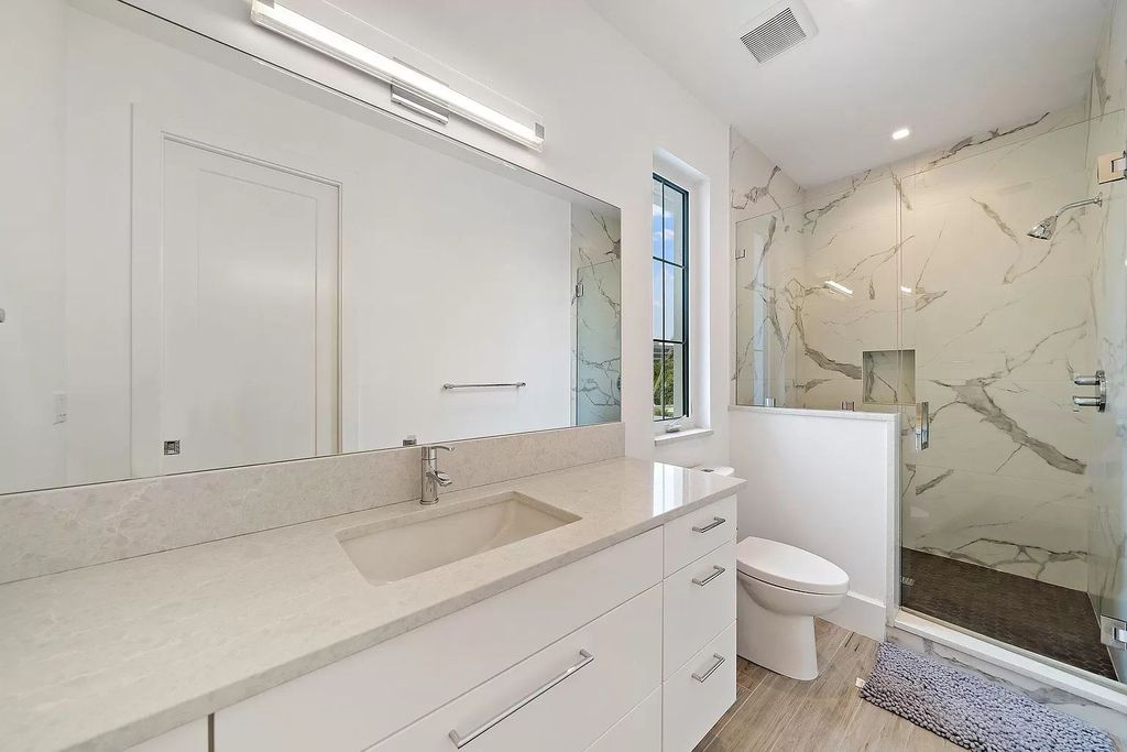 The British West Indies Home is a luxurious estate in Hidden Key offers the finest in family living with deep water access now available for sale. This home located at 11730 Lake Shore Pl, North Palm Beach, Florida; offering 4 bedrooms and 6 bathrooms with over 4,500 square feet of living spaces.