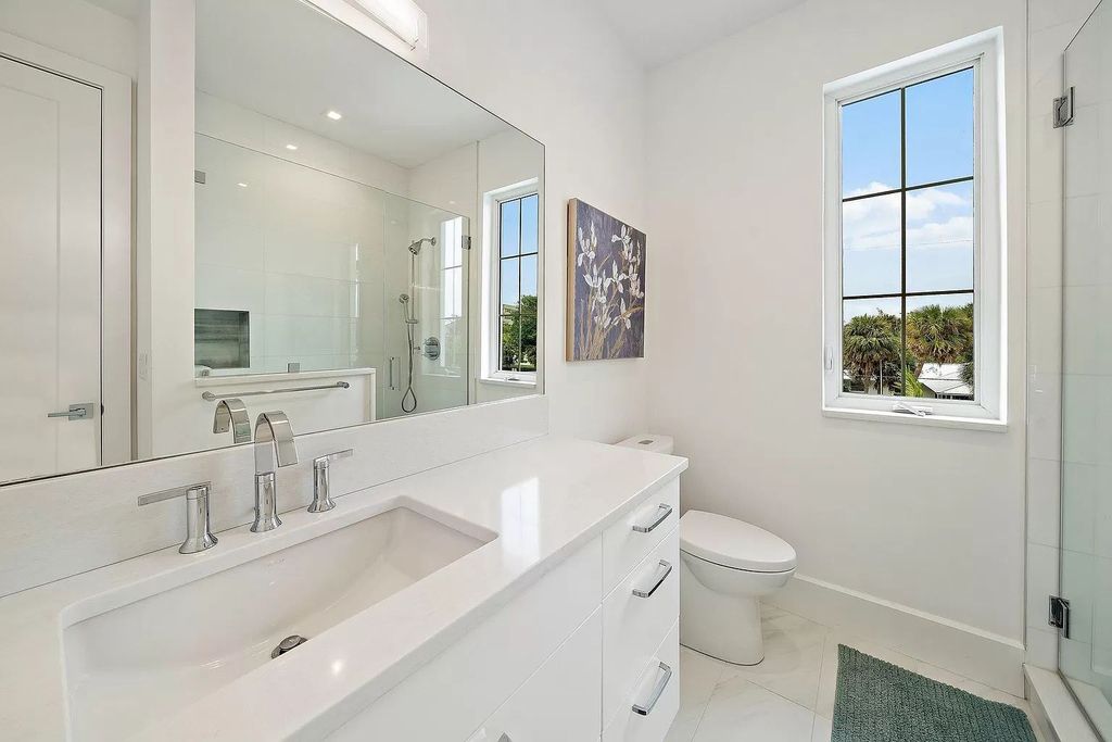 The British West Indies Home is a luxurious estate in Hidden Key offers the finest in family living with deep water access now available for sale. This home located at 11730 Lake Shore Pl, North Palm Beach, Florida; offering 4 bedrooms and 6 bathrooms with over 4,500 square feet of living spaces.