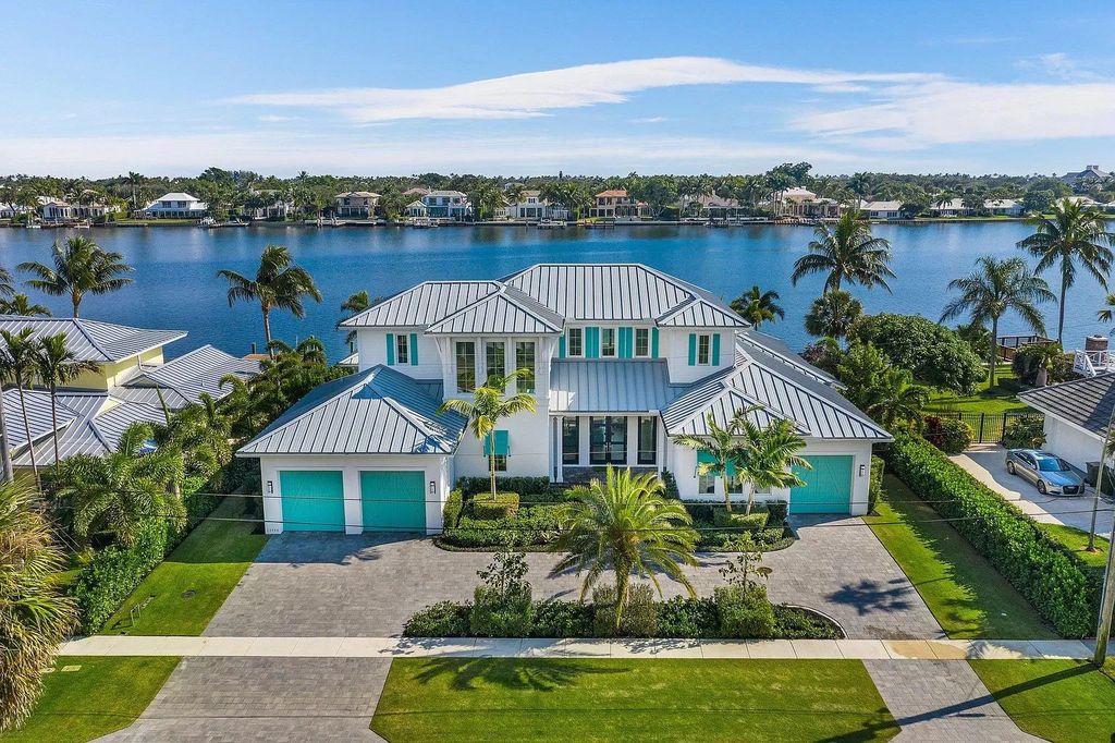 The British West Indies Home is a luxurious estate in Hidden Key offers the finest in family living with deep water access now available for sale. This home located at 11730 Lake Shore Pl, North Palm Beach, Florida; offering 4 bedrooms and 6 bathrooms with over 4,500 square feet of living spaces.