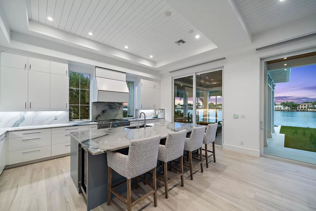 The British West Indies Home is a luxurious estate in Hidden Key offers the finest in family living with deep water access now available for sale. This home located at 11730 Lake Shore Pl, North Palm Beach, Florida; offering 4 bedrooms and 6 bathrooms with over 4,500 square feet of living spaces.