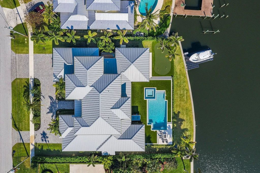 The British West Indies Home is a luxurious estate in Hidden Key offers the finest in family living with deep water access now available for sale. This home located at 11730 Lake Shore Pl, North Palm Beach, Florida; offering 4 bedrooms and 6 bathrooms with over 4,500 square feet of living spaces.