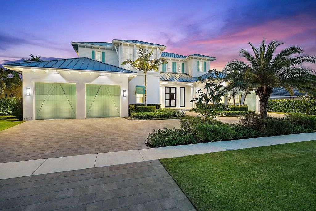 The British West Indies Home is a luxurious estate in Hidden Key offers the finest in family living with deep water access now available for sale. This home located at 11730 Lake Shore Pl, North Palm Beach, Florida; offering 4 bedrooms and 6 bathrooms with over 4,500 square feet of living spaces.