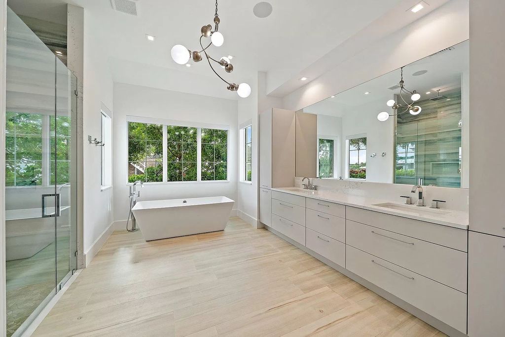 The British West Indies Home is a luxurious estate in Hidden Key offers the finest in family living with deep water access now available for sale. This home located at 11730 Lake Shore Pl, North Palm Beach, Florida; offering 4 bedrooms and 6 bathrooms with over 4,500 square feet of living spaces.