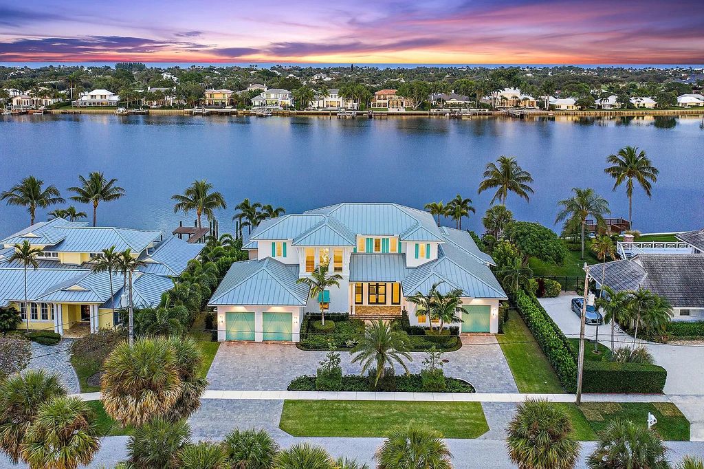 The British West Indies Home is a luxurious estate in Hidden Key offers the finest in family living with deep water access now available for sale. This home located at 11730 Lake Shore Pl, North Palm Beach, Florida; offering 4 bedrooms and 6 bathrooms with over 4,500 square feet of living spaces.