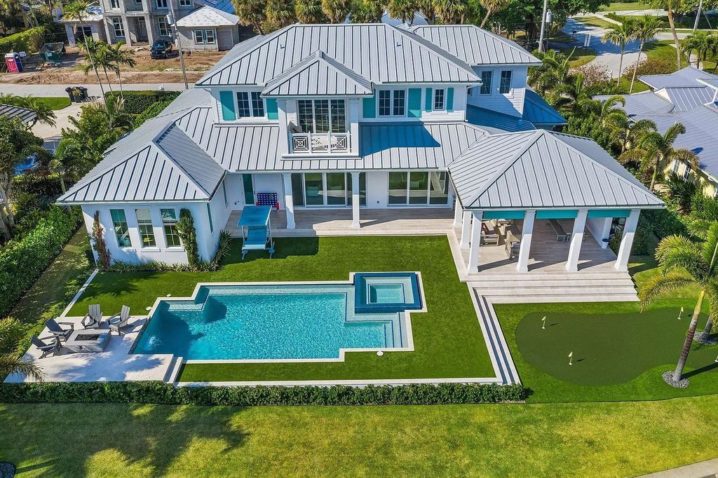 The British West Indies Home is a luxurious estate in Hidden Key offers the finest in family living with deep water access now available for sale. This home located at 11730 Lake Shore Pl, North Palm Beach, Florida; offering 4 bedrooms and 6 bathrooms with over 4,500 square feet of living spaces.
