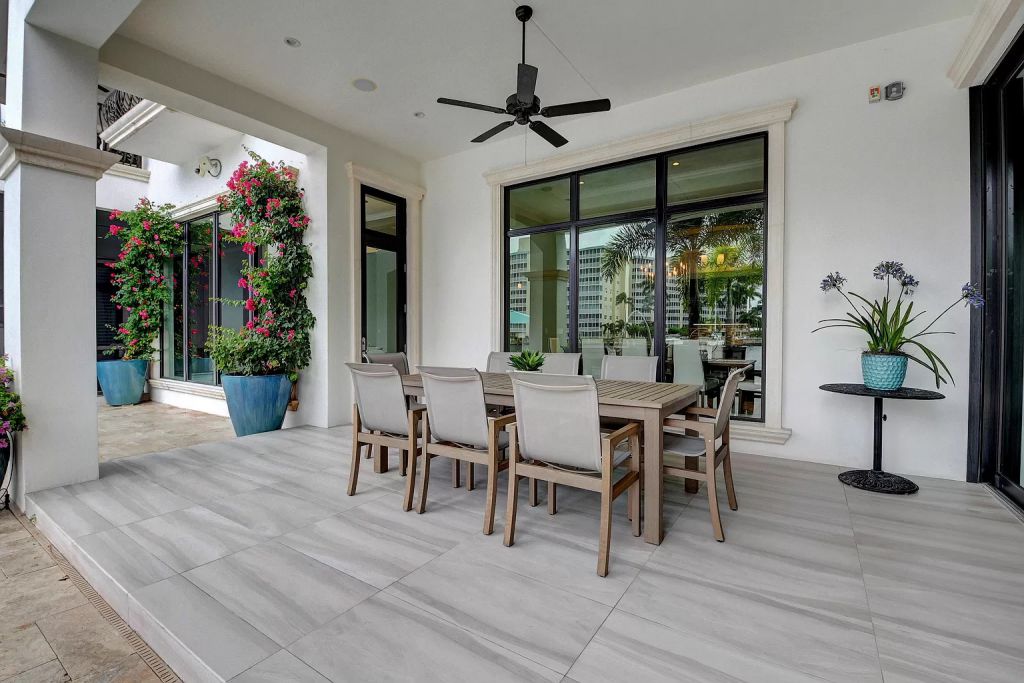 The Boca Raton House is an incredible Intracoastal estate features Resort style living with pool, outdoor kitchen and bar now available for sale. This home located at 7596 NE Orchid Bay Ter, Boca Raton, Florida; offering 5 bedrooms and 7 bathrooms with over 8,000 square feet of living spaces.