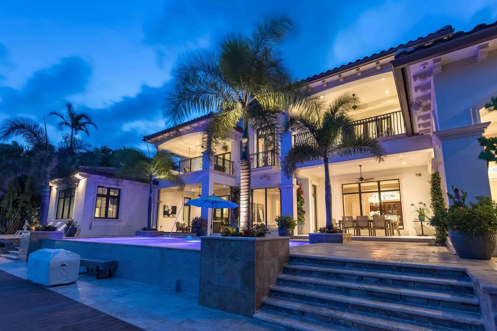 The Boca Raton House is an incredible Intracoastal estate features Resort style living with pool, outdoor kitchen and bar now available for sale. This home located at 7596 NE Orchid Bay Ter, Boca Raton, Florida; offering 5 bedrooms and 7 bathrooms with over 8,000 square feet of living spaces.