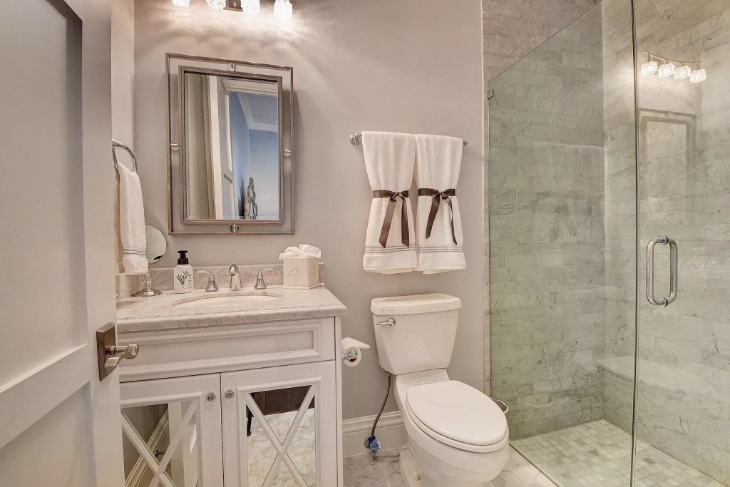 The Boca Raton House is an incredible Intracoastal estate features Resort style living with pool, outdoor kitchen and bar now available for sale. This home located at 7596 NE Orchid Bay Ter, Boca Raton, Florida; offering 5 bedrooms and 7 bathrooms with over 8,000 square feet of living spaces.