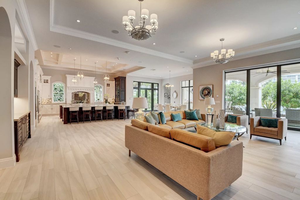 The Boca Raton House is an incredible Intracoastal estate features Resort style living with pool, outdoor kitchen and bar now available for sale. This home located at 7596 NE Orchid Bay Ter, Boca Raton, Florida; offering 5 bedrooms and 7 bathrooms with over 8,000 square feet of living spaces.
