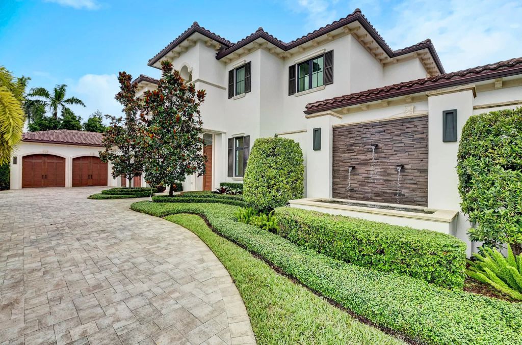 The Boca Raton House is an incredible Intracoastal estate features Resort style living with pool, outdoor kitchen and bar now available for sale. This home located at 7596 NE Orchid Bay Ter, Boca Raton, Florida; offering 5 bedrooms and 7 bathrooms with over 8,000 square feet of living spaces.