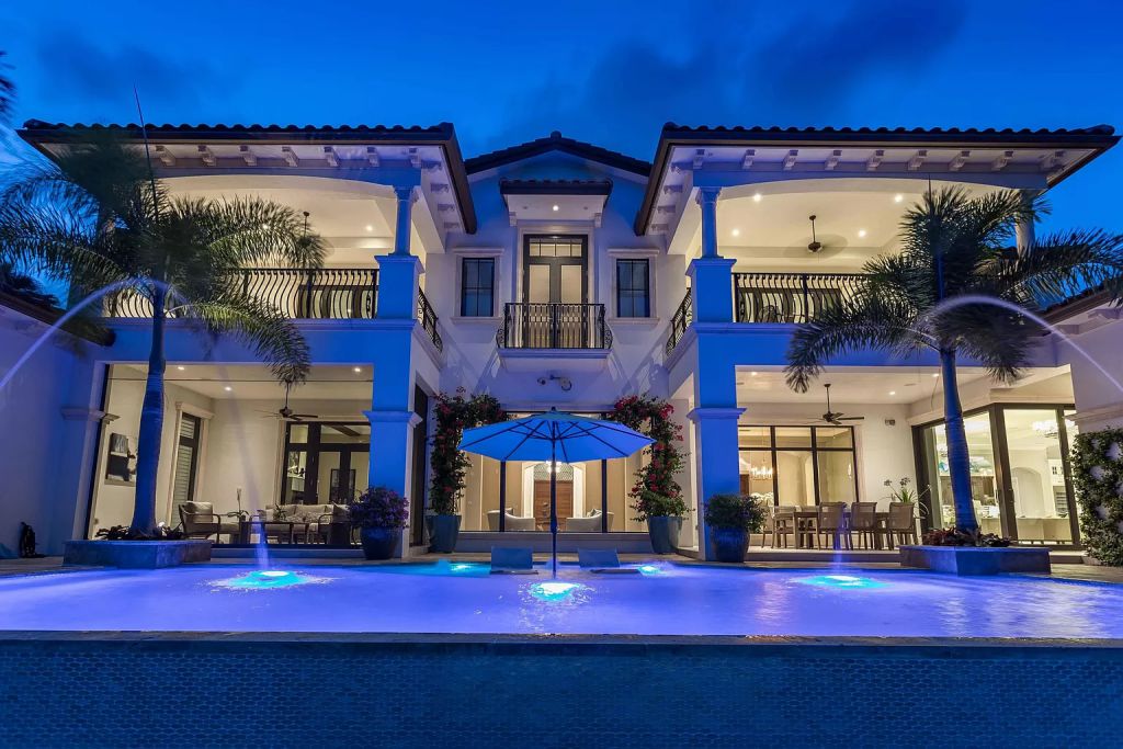 The Boca Raton House is an incredible Intracoastal estate features Resort style living with pool, outdoor kitchen and bar now available for sale. This home located at 7596 NE Orchid Bay Ter, Boca Raton, Florida; offering 5 bedrooms and 7 bathrooms with over 8,000 square feet of living spaces.