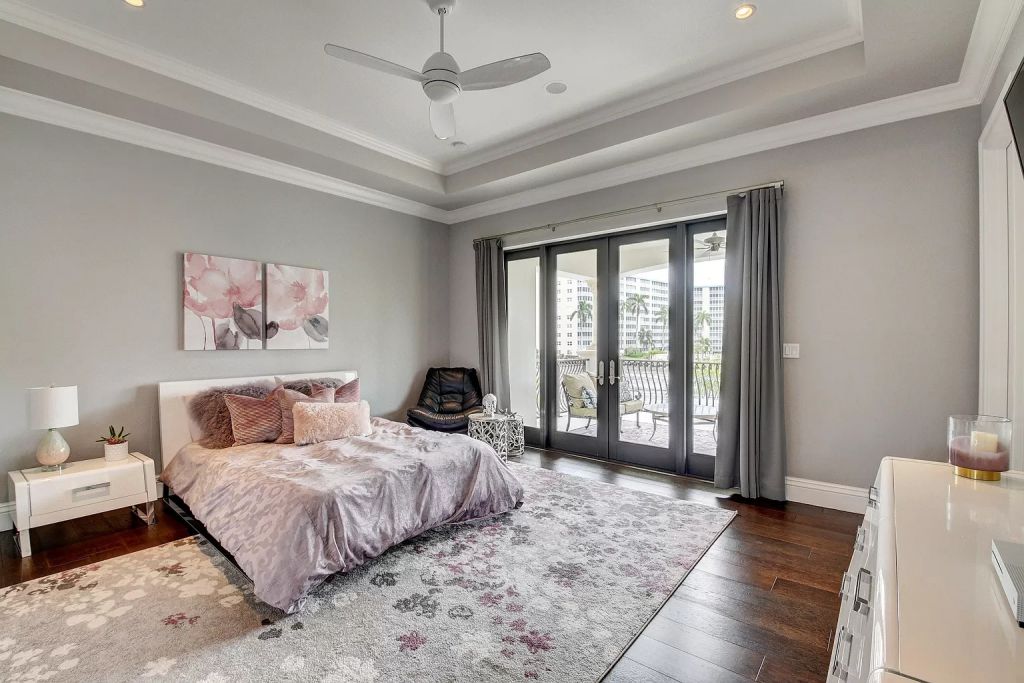 The Boca Raton House is an incredible Intracoastal estate features Resort style living with pool, outdoor kitchen and bar now available for sale. This home located at 7596 NE Orchid Bay Ter, Boca Raton, Florida; offering 5 bedrooms and 7 bathrooms with over 8,000 square feet of living spaces.