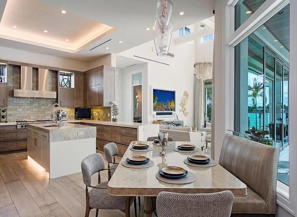 The Home in Naples is a luxurious coastal contemporary style residence features unparalleled quality meets unrivaled views now available for sale. This home located at 1959 8th St S, Naples, Florida; offering 4 bedrooms and 5 bathrooms with over 4,500 square feet of living spaces.