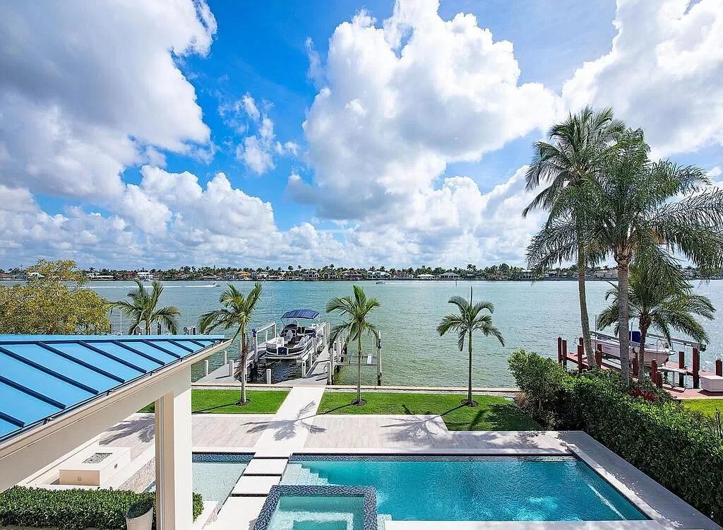 The Home in Naples is a luxurious coastal contemporary style residence features unparalleled quality meets unrivaled views now available for sale. This home located at 1959 8th St S, Naples, Florida; offering 4 bedrooms and 5 bathrooms with over 4,500 square feet of living spaces.