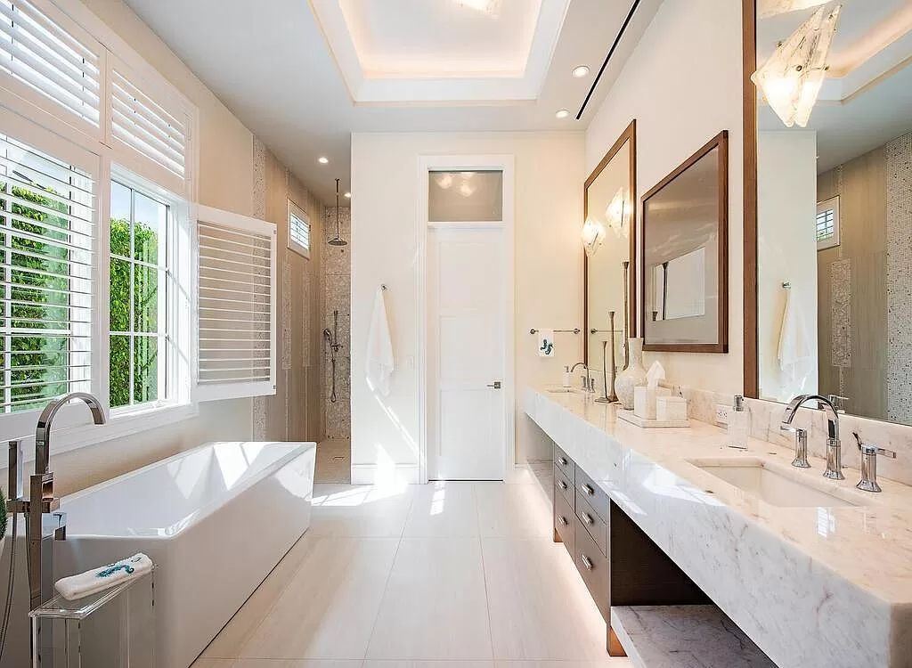 The Home in Naples is a luxurious coastal contemporary style residence features unparalleled quality meets unrivaled views now available for sale. This home located at 1959 8th St S, Naples, Florida; offering 4 bedrooms and 5 bathrooms with over 4,500 square feet of living spaces.