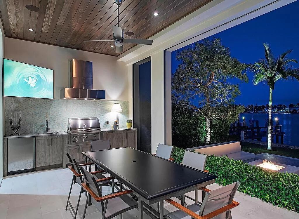 The Home in Naples is a luxurious coastal contemporary style residence features unparalleled quality meets unrivaled views now available for sale. This home located at 1959 8th St S, Naples, Florida; offering 4 bedrooms and 5 bathrooms with over 4,500 square feet of living spaces.