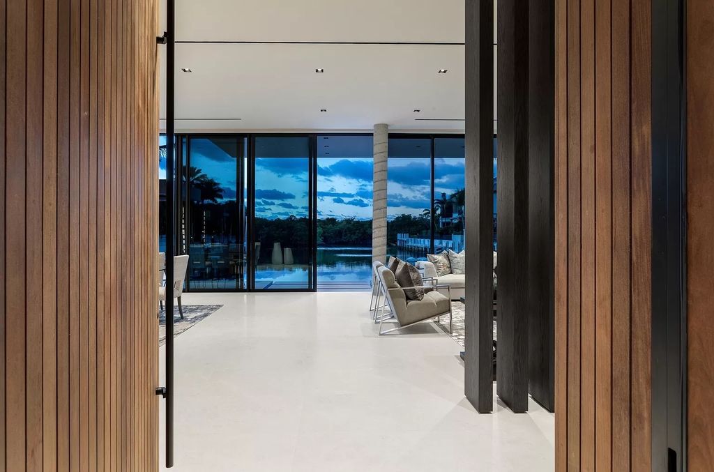 The Boca Raton House is an architectural deepwater estate in The Sanctuary with 3-levels of luxury and style now available for sale. This home located at 824 Pelican Point Cv, Boca Raton, Florida; offering 7 bedrooms and 10 bathrooms with over 7,300 square feet of living spaces.