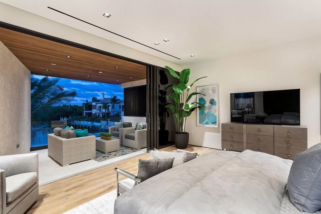 The Boca Raton House is an architectural deepwater estate in The Sanctuary with 3-levels of luxury and style now available for sale. This home located at 824 Pelican Point Cv, Boca Raton, Florida; offering 7 bedrooms and 10 bathrooms with over 7,300 square feet of living spaces.