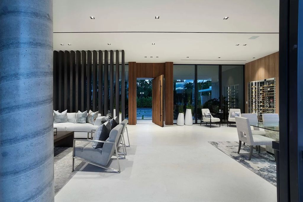 The Boca Raton House is an architectural deepwater estate in The Sanctuary with 3-levels of luxury and style now available for sale. This home located at 824 Pelican Point Cv, Boca Raton, Florida; offering 7 bedrooms and 10 bathrooms with over 7,300 square feet of living spaces.